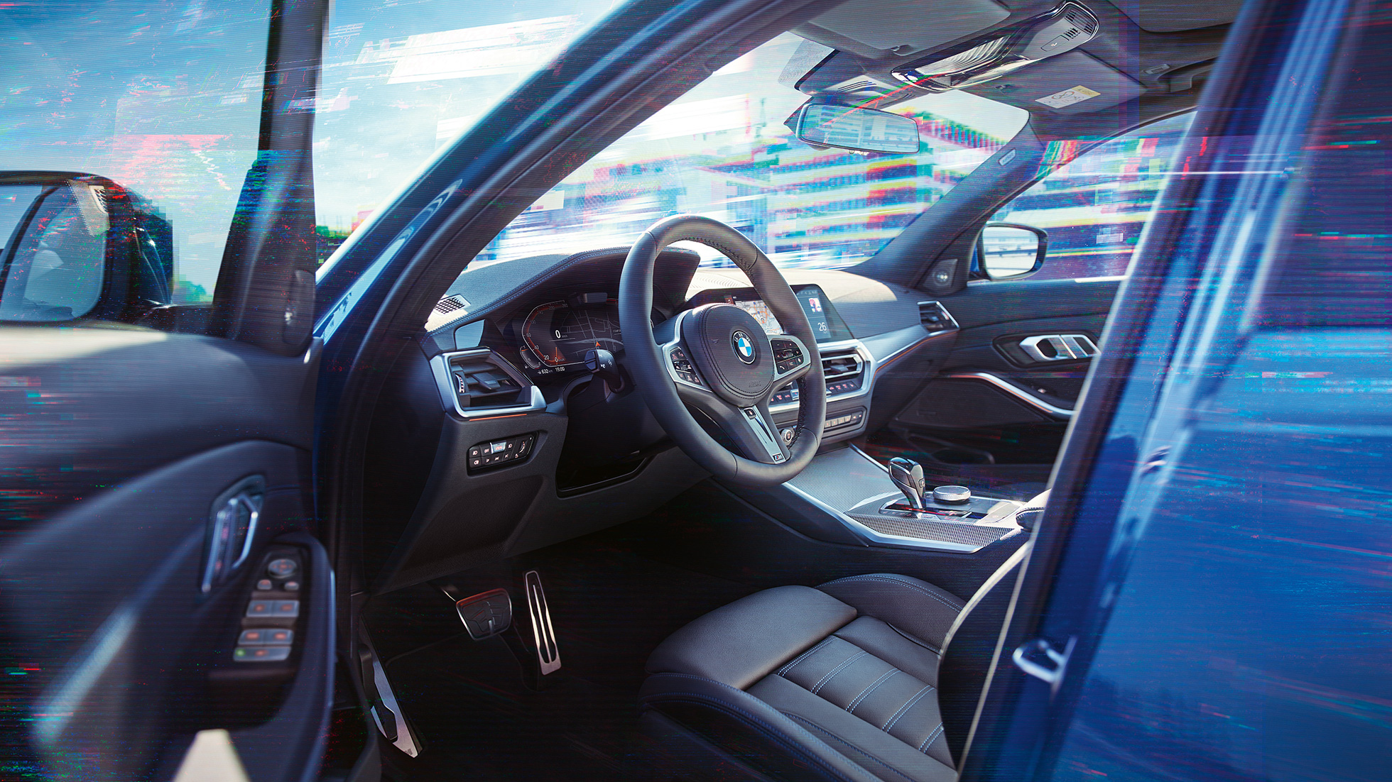 BMW Serie 3 Sedán, interior. Acercamiento al compartimiento del conductor en el interior del BMW Serie 3 Sedán.