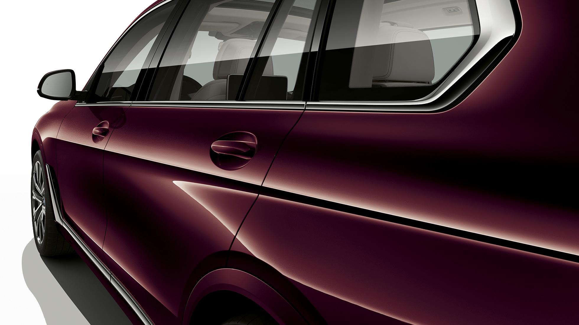 Cabina con Paquete M Deportivo para BMW X7 Acercamiento frontal de la cabina del conductor del BMW X7 con características del paquete deportivo M